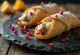 Cannoli z granatnim jabolkom in marcipanom