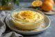 Rasmalai s pomarančno lupinico, okrašen z mandlji, sveža in bogata sladica.
